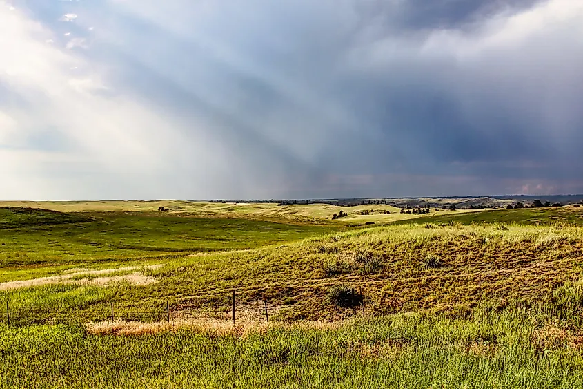 Sun Rays through Dark Summer Thunderstorms over the Northwestern Nebraska Grassland.