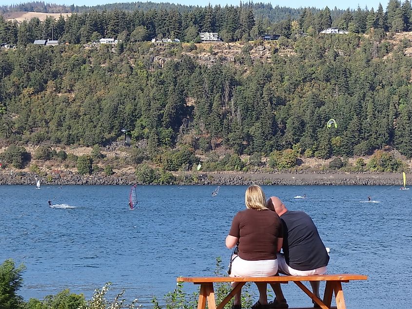 A couple enjoying quality time along the Columbia River at Hood River, Oregon.