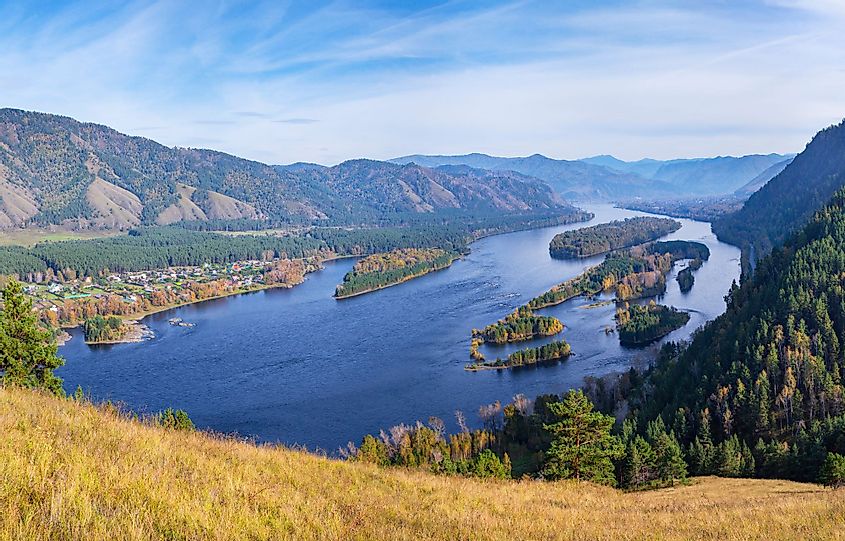 The Yenisei River flows through a picturesque valley