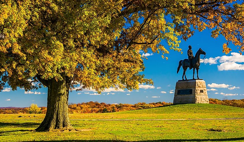 Tree and statue on a battlefield at Gettysburg, Pennsylvania.