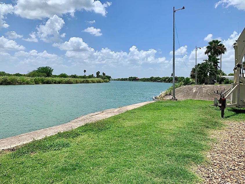 McAllen, Texas: Rio Grande river on the US side, via MechanicSloth / Shutterstock.com