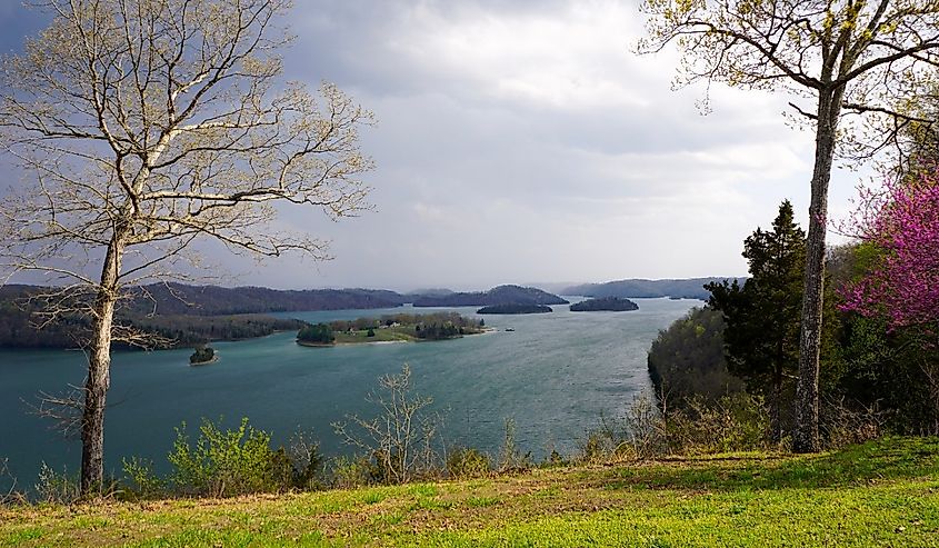 Lakefront Park Islands Dale Hollow State Resort fall evening before storm in Kentucky and Tennessee border lodge patio Overlook of Mountain lake trees with very colorful foreground and background