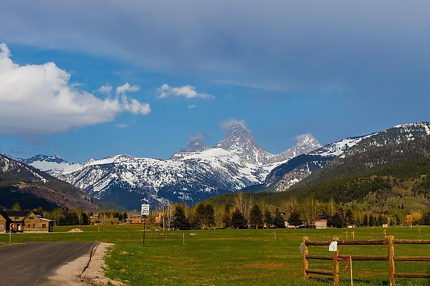 Snow covered Teton mountains during spring taken from Idaho Wyoming state line