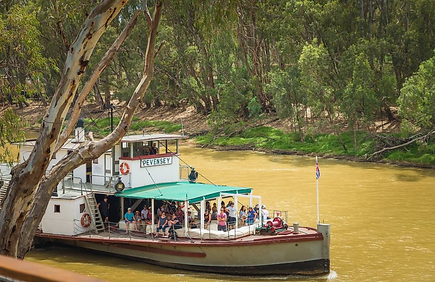 People enjoying a cruise on the Murray River in Echuca, Victoria, Australia
