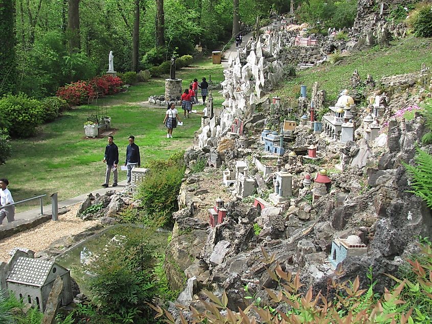 Miniature reproductions of religious structures worldwide, created by a local monk, adorn Ave Maria Grotto in Cullman, Alabama, via Larry Porges / Shutterstock.com