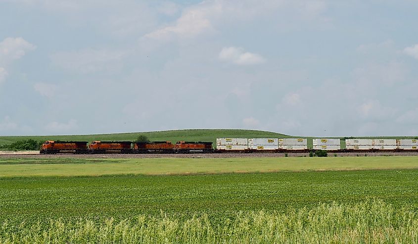 High priority double stack container train races through the Flint Hills of Kansas, Matfield Green, Kansas.