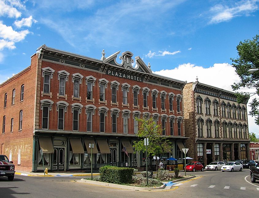Las Vegas, New Mexico USA - July 25, 2013: Historic Plaza Hotel, built 1881 in Italianate style was called The Belle of the Southwest, listed on the National Register of Historic Places, via Underawesternsky / Shutterstock.com