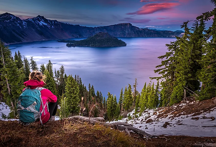 The deep blue water of Crater Lake with Wizard Island, Crater Lake National Park, Oregon.