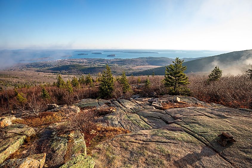 Scenic sunrise at the top of Cadillac mountain North Ridge trail Acadia National park. Credit: Photo Spirit / Shutterstock