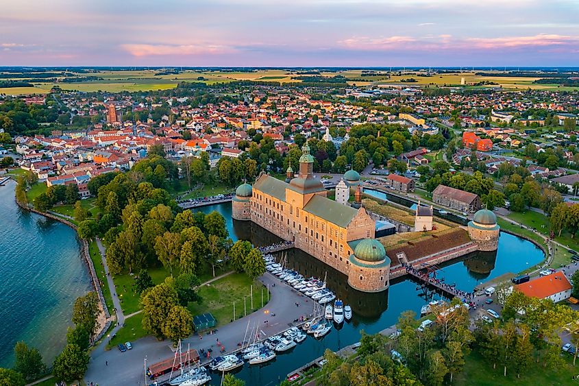 Aerial view of Vadstena and its castle at sunset, Sweden.