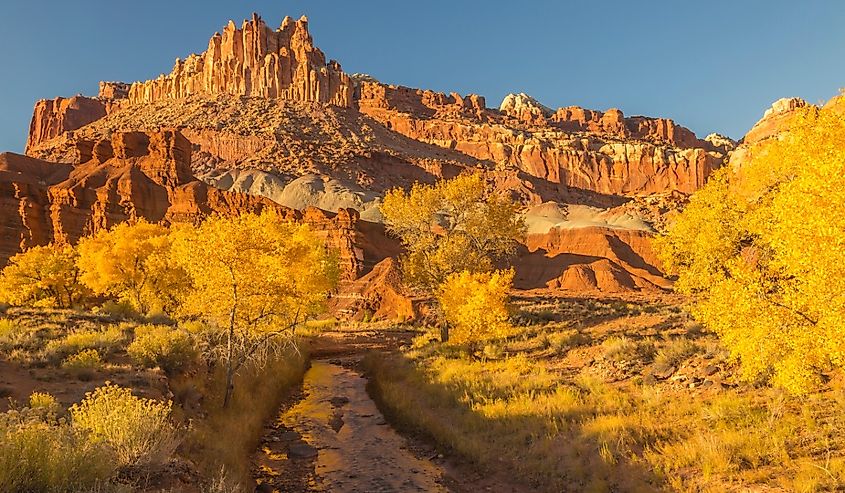 USA, Utah, Capitol Reef National Park. The Castle rock formation and Fremont River.