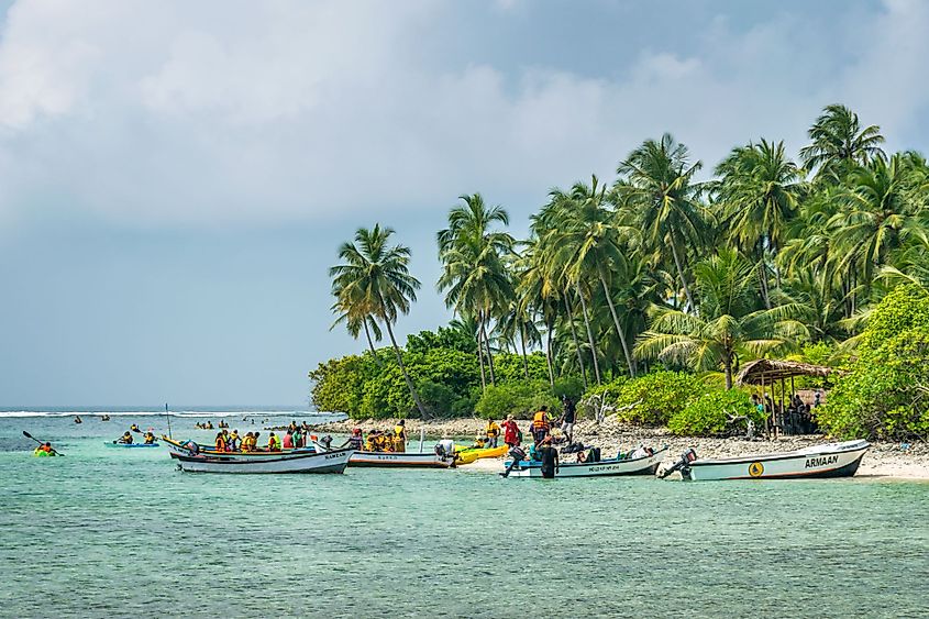 Tourists engage in watersports in Kalpeni Island, Lakshadweep, India. 