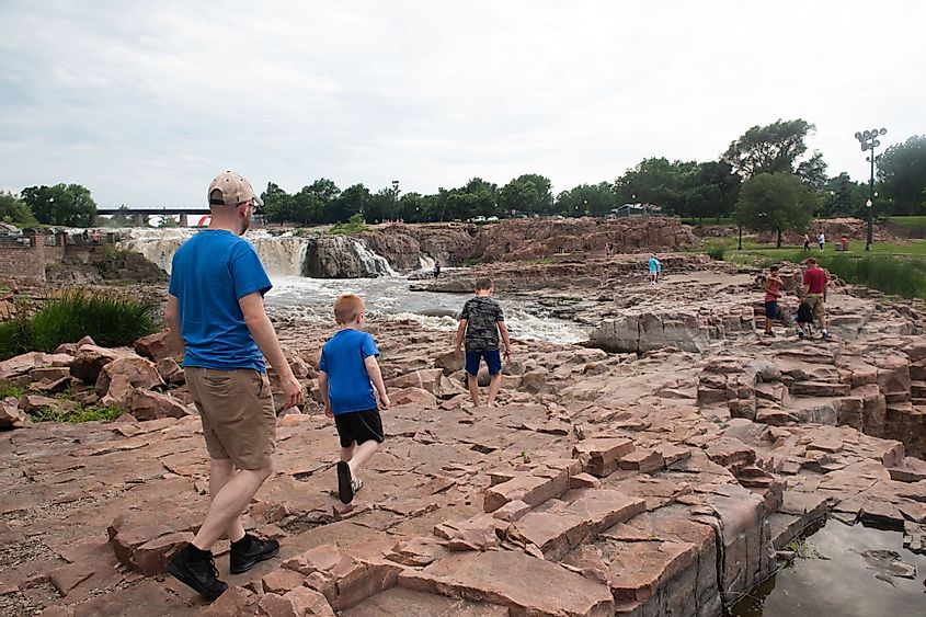 Tourists explore Falls Park in Sioux Falls, South Dakota