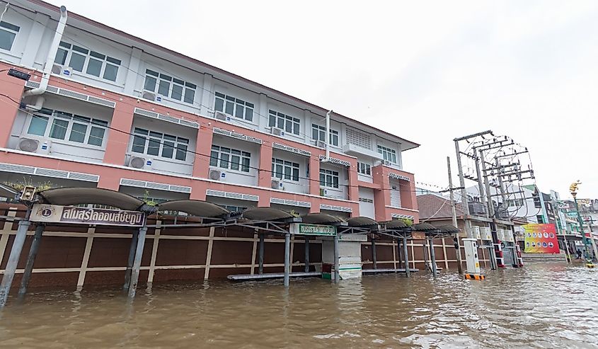 Chaiyaphum, Thailand - 29 September 2022 : Flooding at a bus stop After heavy rain due to Typhoon Noru