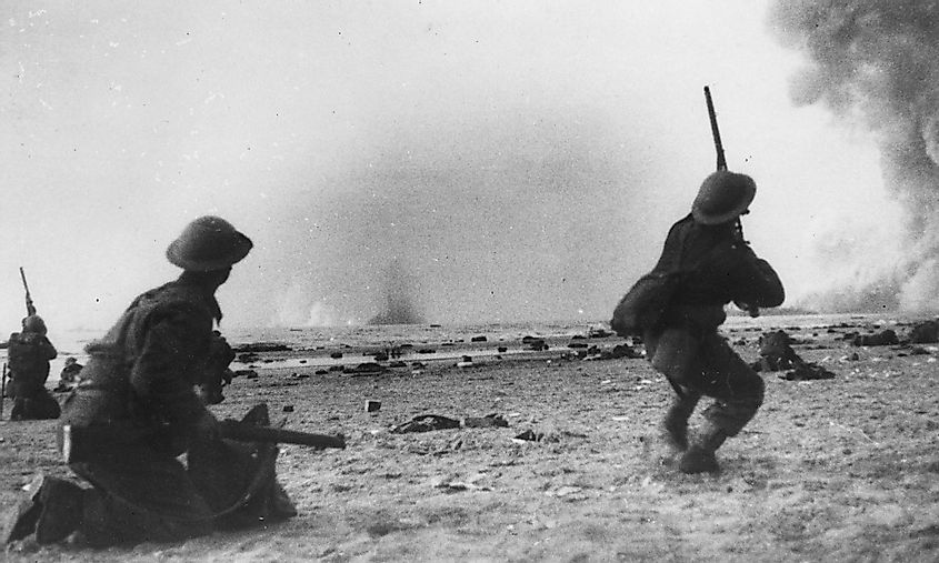 Soldiers from the British Expeditionary Force fire at low flying German aircraft during the Dunkirk evacuation