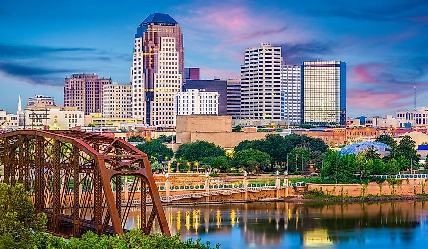 Shreveport, Louisiana, USA skyline over the Red River at dusk.