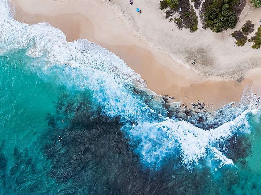 High-angle aerial photograph capturing the scenic beauty of Sandy Beach on Oahu, Hawaii