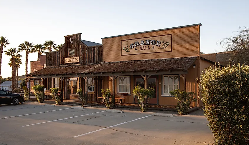 View of the Grange Hall and the Livery room at the Palm Canyon Hotel and RV Resort at Borrego Springs, California, via Rosamar / Shutterstock.com