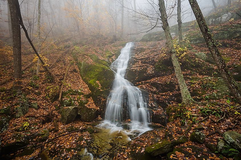 Crabtree Falls on a foggy autumn day in George Washington National Forest near the Blue Ridge Parkway in Virginia