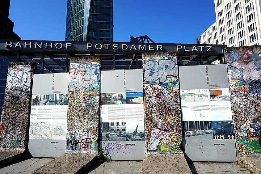 Original pieces of the Berlin Wall lined up for a history exhibition on Potsdamer Platz. Editorial credit: Alexander Ruszczynski / Shutterstock.com