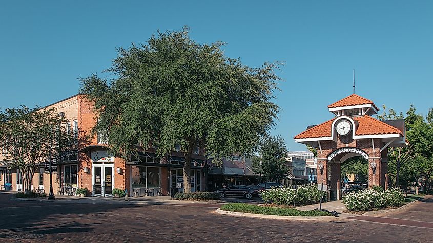 Historic brick clock tower at the intersection of Plant and Main street in downtown Winter Garden