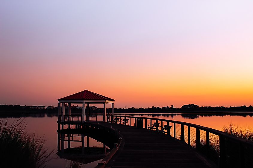 Beautiful lake landscape at sunrise. Lake Baldwin view from Harbor Park, FL.