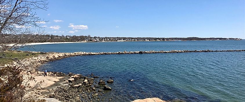View of the Rocky Neck State Park jetty, beach and the Giants Neck area shoreline in the Niantic section of East Lyme, Connecticut