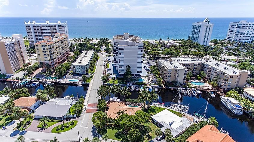 Aerial view showing residential houses, condominium buildings