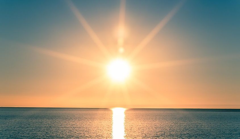 Sunset over ocean (Credit: stockelements via Shutterstock)