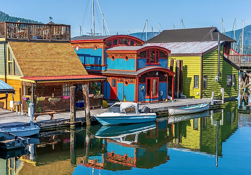 Colourful houseboats and boats on the ocean at Cowichan Bay, Vancouver Island, British Columbia, Canada