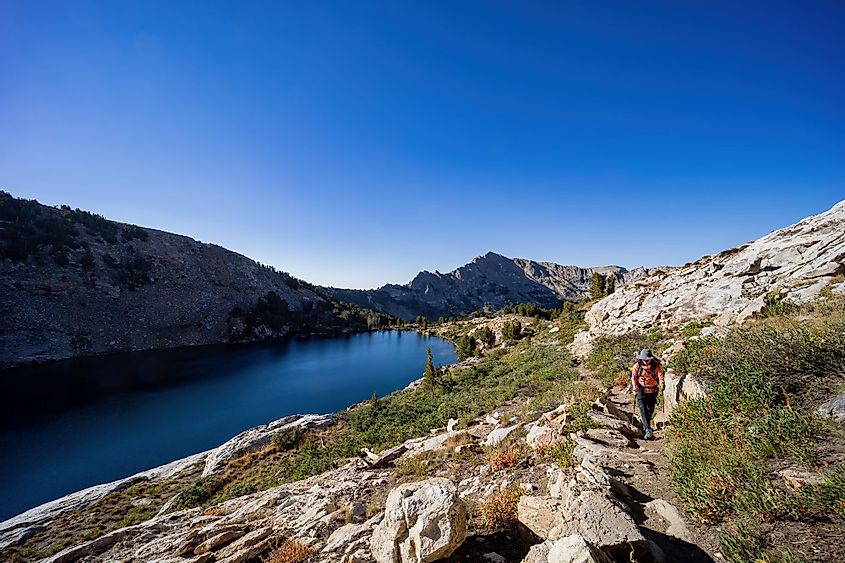 A backpacker hiking in the beautiful Liberty Lake at Ruby Mountain, Nevada