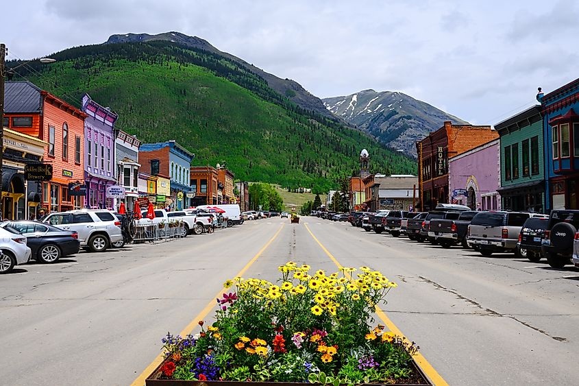 Greene Street in Silverton, Colorado, with local businesses housed in colorful buildings.