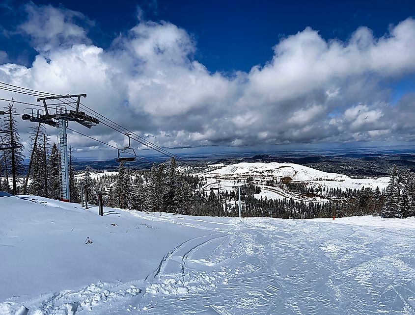 Lead, South Dakota - March 22, 2022: Bright sun shining on snow on a spring day at Terry Peak in South Dakota.