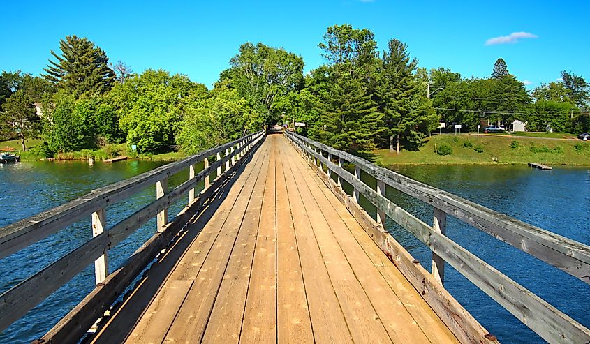 Rustic wooden trestle across the Bearskin State Trail in Minocqua Wisconsin