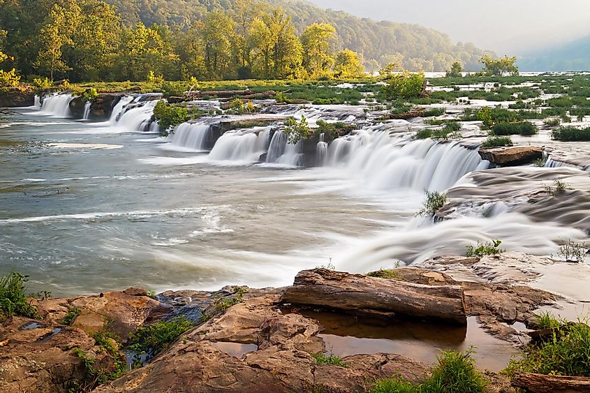 West Virginia's New River, a national scenic river, tumbles over a very wide and very beautiful waterfall near Hinton called Sandstone Falls