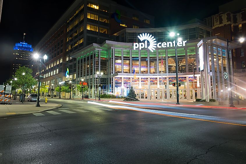 Allentown's PPL Center lit up at night by streetlights