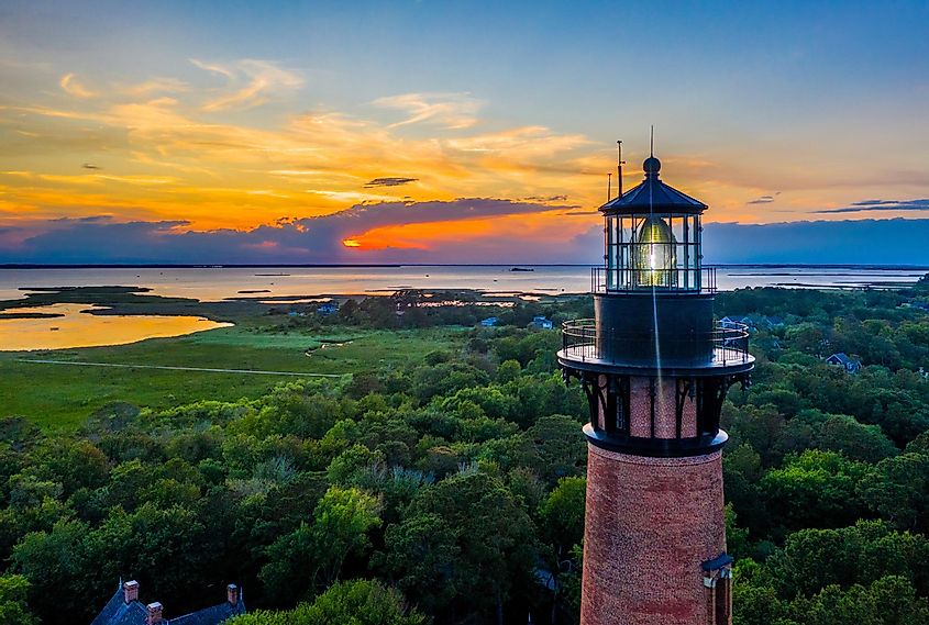 Aerial view of Currituck Beach Lighthouse at sunset near Corolla, North Carolina (Outer Banks).