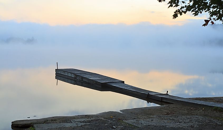 Reflections in the Eighth Lake in the Fulton Chain Lakes in the Adirondacks Mountains of New York