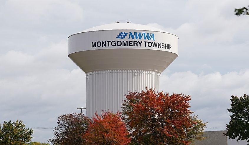 The water tower of NWWA Montgomery Township with the fall foliage.
