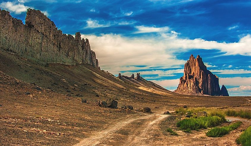 Shiprock, a remnant of an ancient volcano, sits in the middle of the desert on the Navajo Indian Reservation in the northwest corner of New Mexico in the United States.