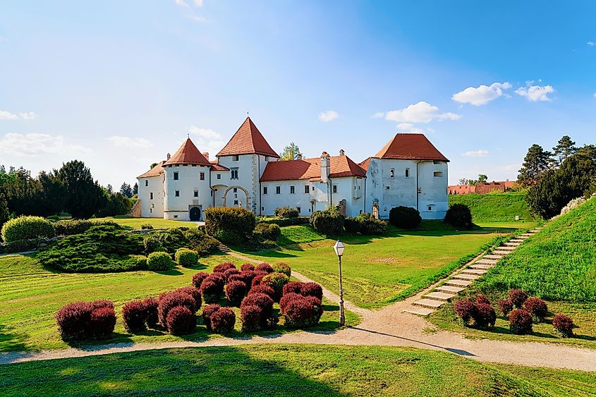 View of Castle on Street of Old city of Varazdin in Croatia. Panorama and Cityscape of famous Croatian town in Europe in summer. Travel and tourism for tourists. Via Shutterstock / Roman Babakin.