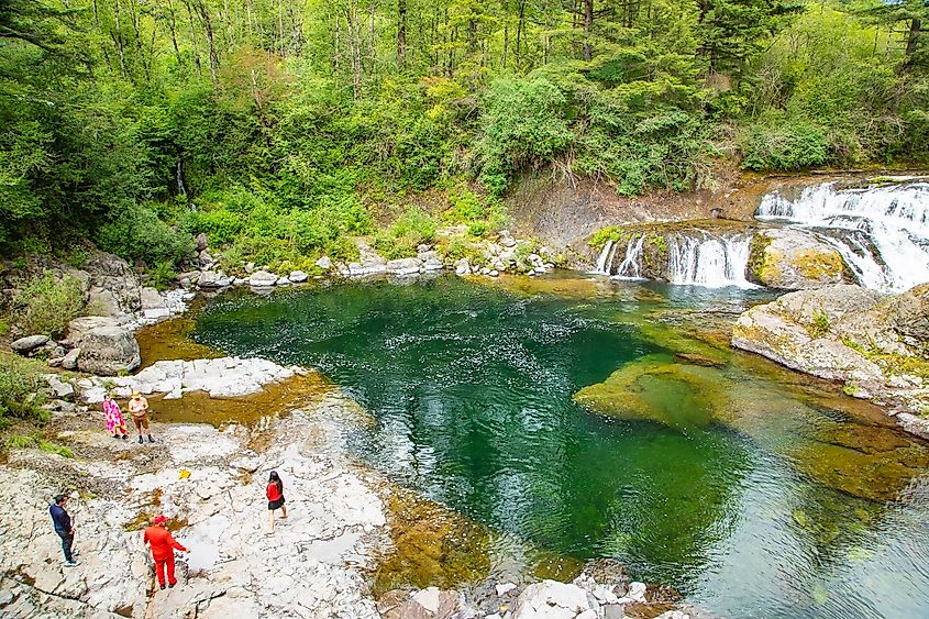 Hikers enjoying Dougan Falls and the swimming hole. Editorial credit: Tangent Imagez / Shutterstock.com