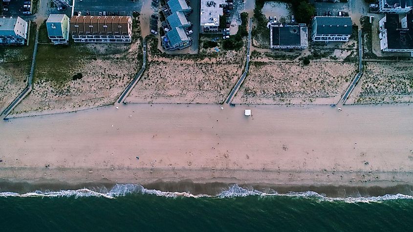An aerial drone view of Dewey Beach, a popular vacation spot among East Coast tourists near Rehoboth Beach and Lewes in Delaware.
