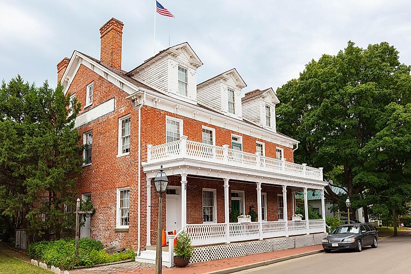 Old Hotel flying the American Flag in Ste. Genevieve, Missouri, USA.