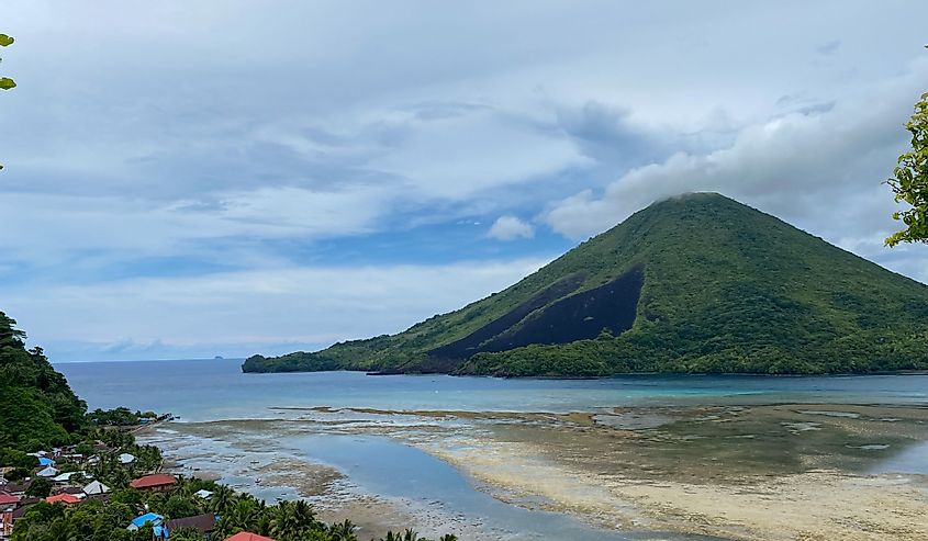 The Banda volcano or known as Gunung Api Banda seen from the island of Banda Besar at low tide