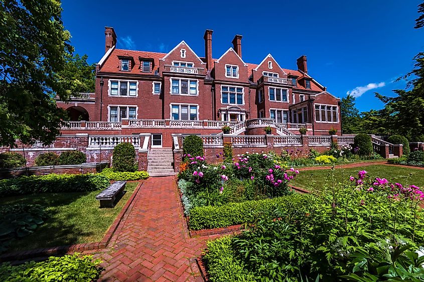 The famous Glensheen Mansion and its summer garden display in Duluth, Minnesota