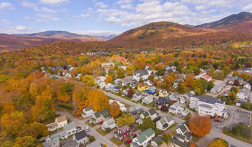 Lincoln Main Street at town center and Little Coolidge Mountain on Kancamagus Highway aerial view with fall foliage, Town of Lincoln, New Hampshire