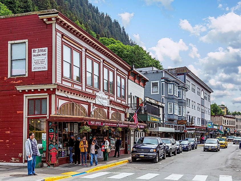 People and cars on a downtown street in Juneau, Alaska.