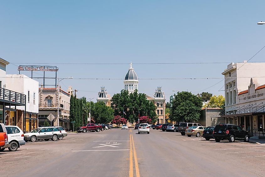 Marfa, Texas: A view of the courthouse building in Marfa Texas during a bright summer day, via jmanaugh3 / Shutterstock.com