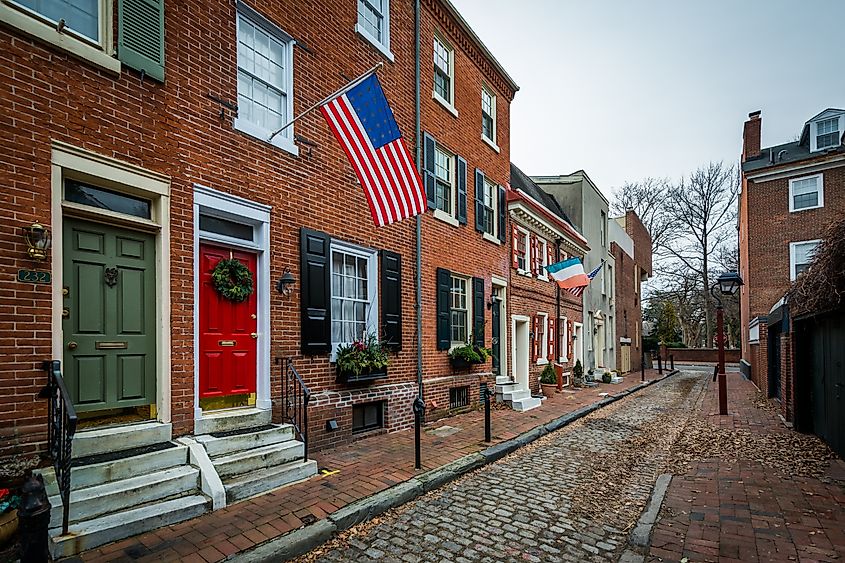 Historic brick buildings and cobblestone street in Society Hill, Philadelphia, Pennsylvania.